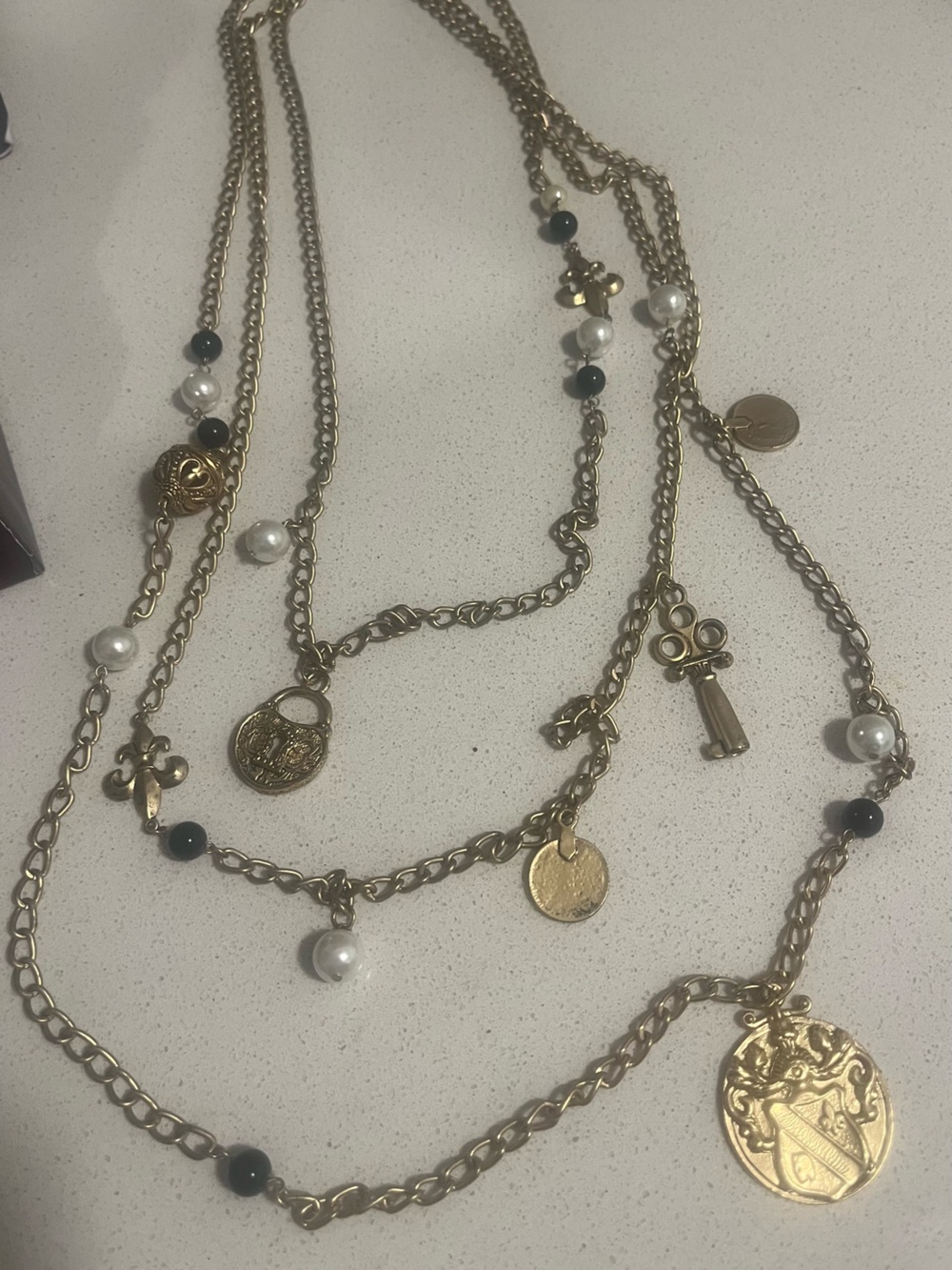 Gold-Tone Layered Charm Necklace with Black and Pearl Beads